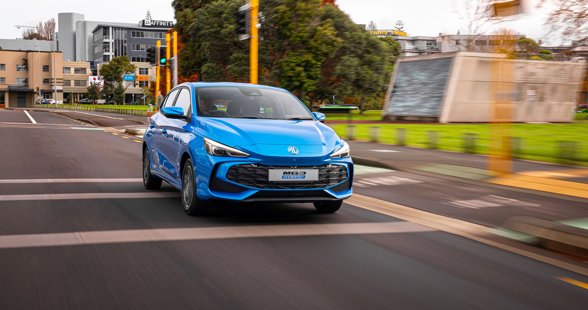 MG3 HYBRID+ cruising down street