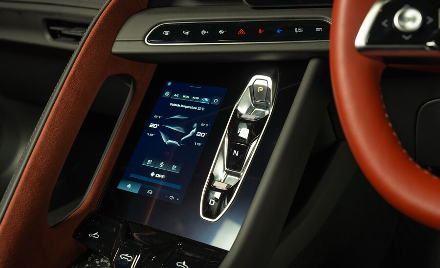 MG Cyberster close up view of gear selector and climate control touchscreen